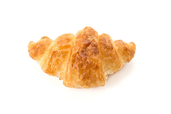 Croissant de beurre sur fond blanc — Photo