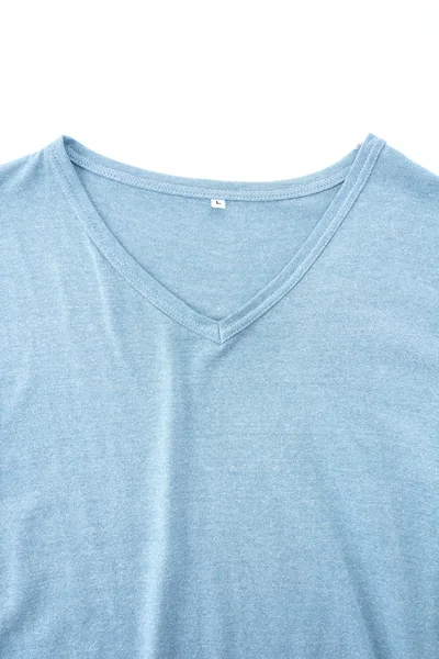 Camisa. t-shirt dobrada sobre fundo branco — Fotografia de Stock