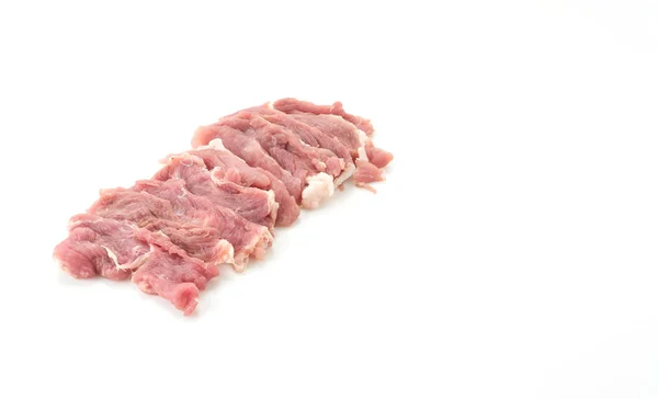 Plátek vepřové maso na bílém pozadí — Stock fotografie