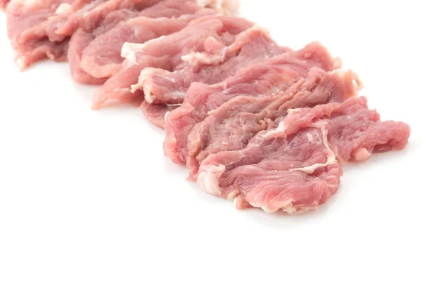 Carne de porco de fatia na placa de madeira — Fotografia de Stock