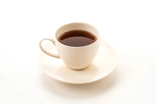 Xícara de chá no fundo branco — Fotografia de Stock