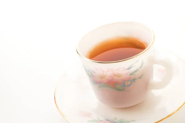 Teetasse auf weißem Hintergrund — Stockfoto