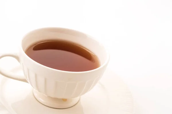 Šálek čaje na bílém pozadí Stock Fotografie