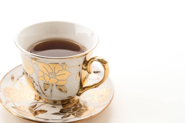 Beyaz arkaplanda çay fincanı