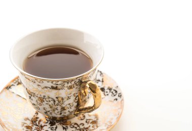 Beyaz arkaplanda çay fincanı