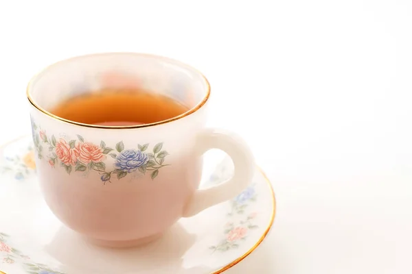 Te kopp på vit bakgrund — Stockfoto