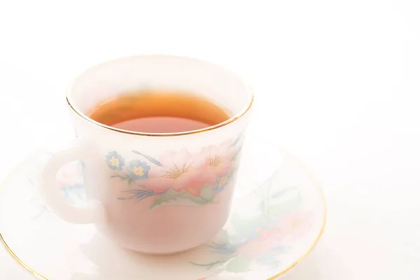 Tasse à thé sur blanc — Photo