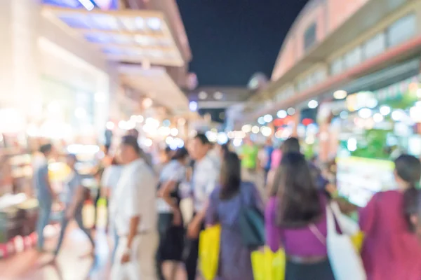 Abstrato borrão pessoas multidão no mercado de rua — Fotografia de Stock