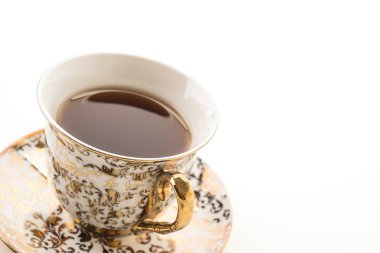 Beyaz arkaplanda çay fincanı