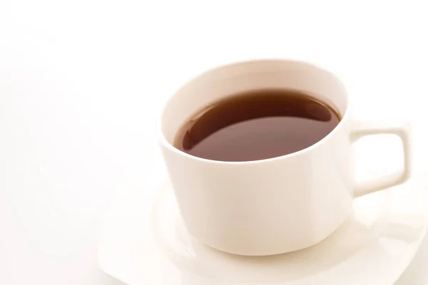 Чайна чашка на білому фоні — стокове фото