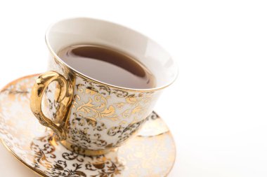 Beyaz arkaplanda çay fincanı