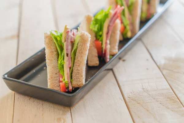 Sandwich  on wood background — Stock Photo, Image