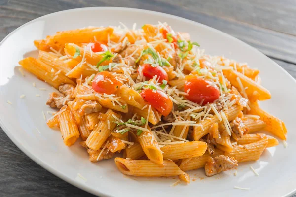 Penne pasta in tomato sauce — Stock Photo, Image