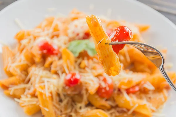 Penne pasta in tomato sauce — Stock Photo, Image