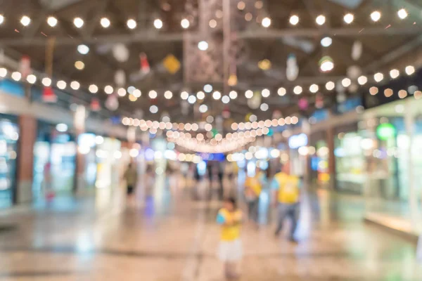 Abstrato borrão pessoas multidão no mercado de rua — Fotografia de Stock