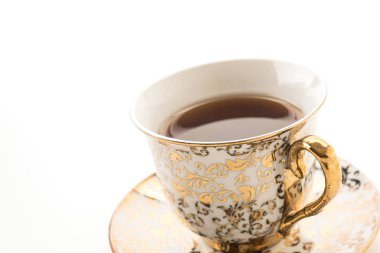 Beyaz arkaplanda çay fincanı