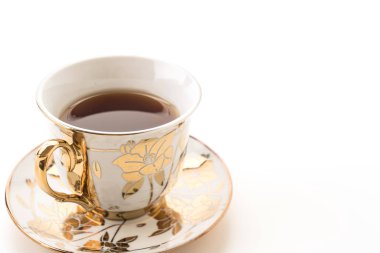 Beyaz arkaplanda çay fincanı