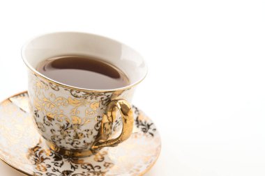 Beyaz arkaplanda çay fincanı