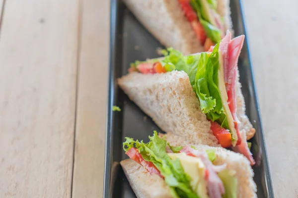 Sandwich  on wood background — Stock Photo, Image