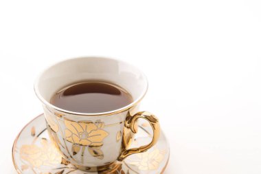 Beyaz arkaplanda çay fincanı