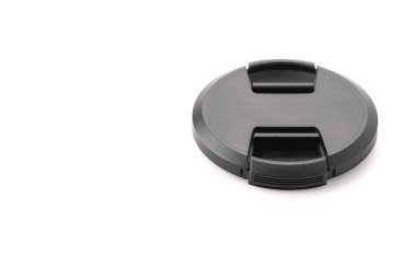 beyaz zemin üzerinde objektif kapağı