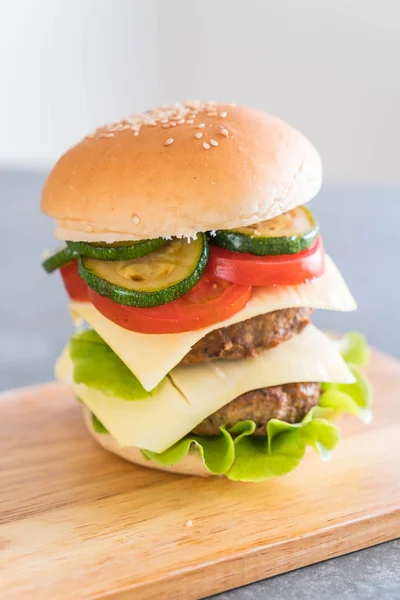 Burger on wood plate  - American food — Stock Photo, Image