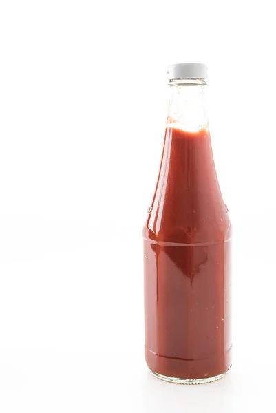 Пляшка соусу на білому фоні — стокове фото