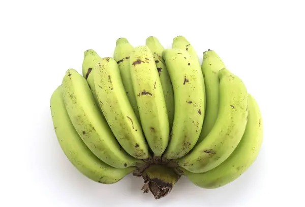 Banana verde su sfondo bianco — Foto Stock