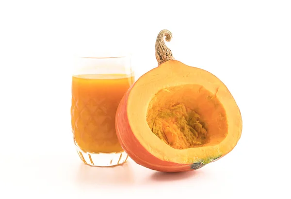 Pumpkin juice on white background Stock Image