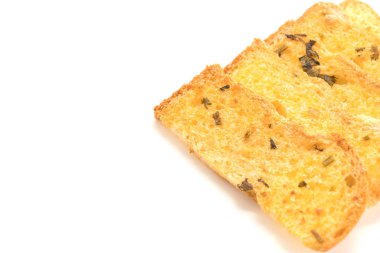 Sarımsak ve bitkisel ekmek dilimleri.