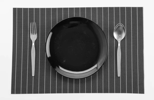 Plattan matta med plattan gaffel och kniv — Stockfoto