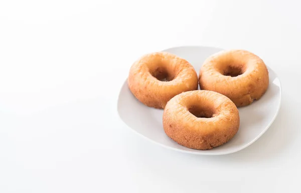 Donut on white plate — Stock Photo, Image