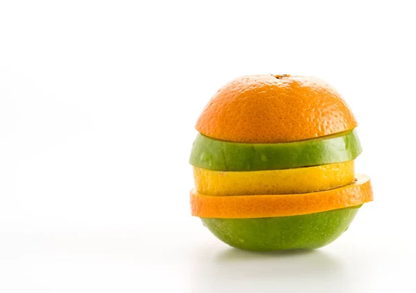 Pommes tranchées et fruits à l'orange — Photo