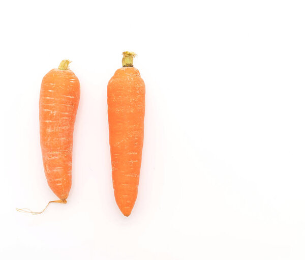 baby carrots on white background