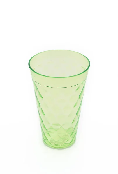 Зеленая пластиковая чашка — стоковое фото
