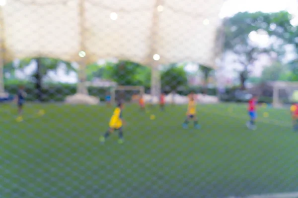 Abstraktní rozmazané fotbalové hřiště — Stock fotografie