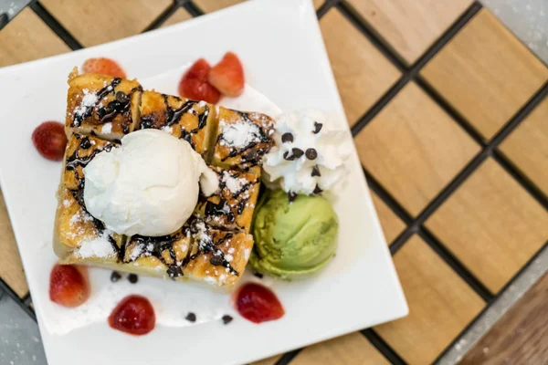 honey toasts with strawberry, vanilla and green tea ice-cream