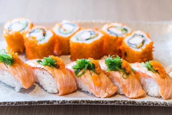 salmon sushi and salmon maki