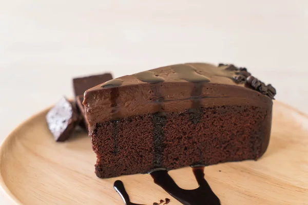 Chocolate cake on wood — Stock Photo, Image