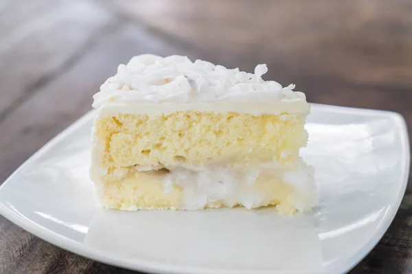 Coconut cake on plate — Stock Photo, Image