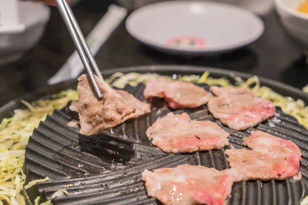 Pork sliced grilling on pan — Stock Photo, Image