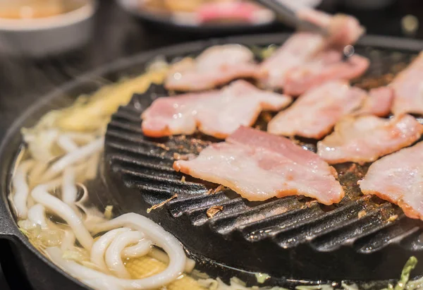 Pork sliced grilling on pan — Stock Photo, Image