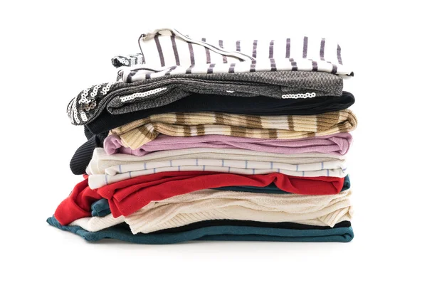 Stacks of clothing on white — Stock Photo, Image