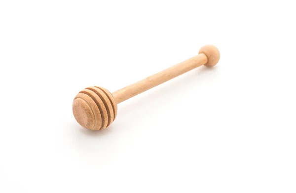 Wooden honey stick on white — Stock Photo, Image