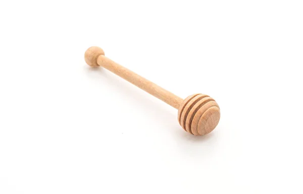 Wooden honey stick on white — Stock Photo, Image