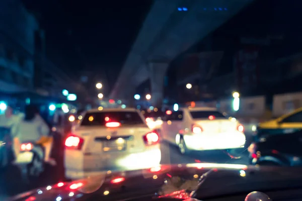 Blurred traffic jam on rush hour time, shooted from inside of ca — Stock Photo, Image