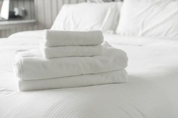 White towel on bed decoration in bedroom interior — Stock Photo, Image