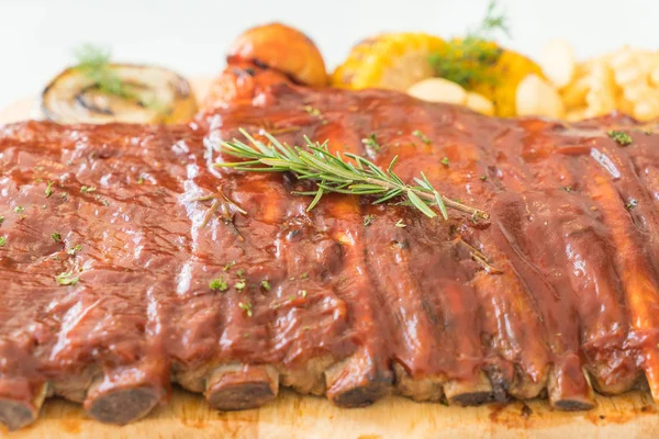 Grilled rib pork with barbecue sauce and vegetable and frech fri — Stock Photo, Image