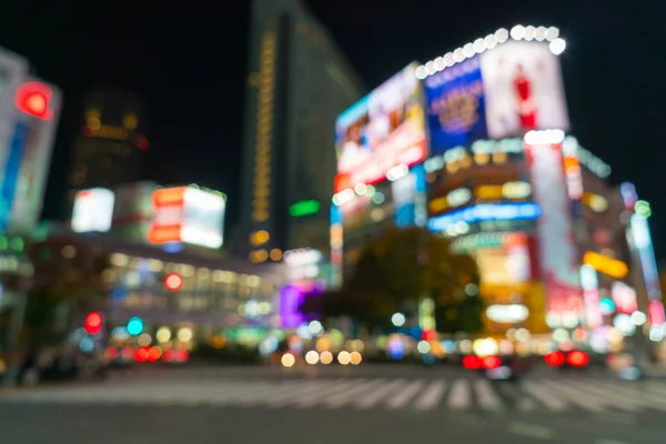 Abstrakte Unschärfe verwirrt Menschen auf dem Fußgängerüberweg in Shibuya-Stadt — Stockfoto