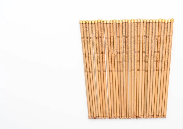 Бамбукові палички на білому — стокове фото